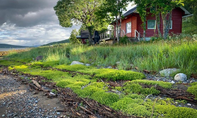 Laukeng House | Experience The Red Fjordhouse: Oceanfront Bliss Awaits