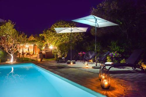 Dassia Villa | Discover The Red House in Dassia: Oceanfront Bliss Awaits