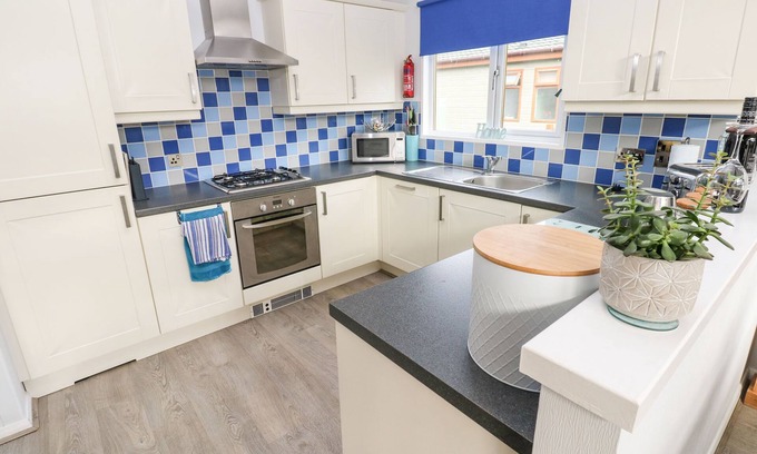 Amroth Cottage | Oceanfront Getaway at The Retreat: Pet Friendly & Family Fun