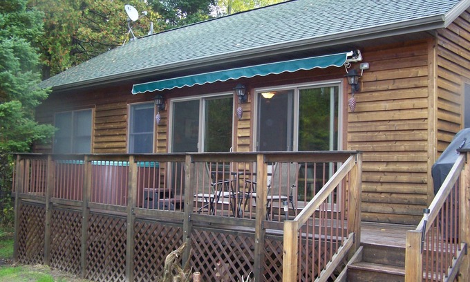 Indian River Cabin | Experience Riverfront Relaxation with Hot Tub & Wi-Fi