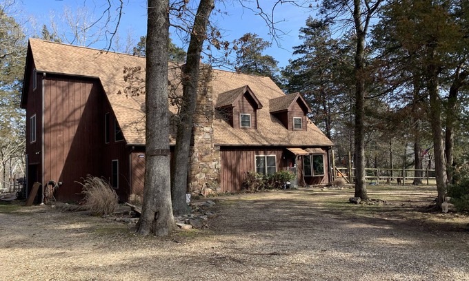 Scraper House | Experience The River’s Edge: Pool, Spa & Family Fun Await
