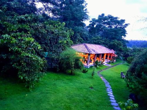 Virajpet House | Discover The Road's End: Family-Friendly Retreat with Pool