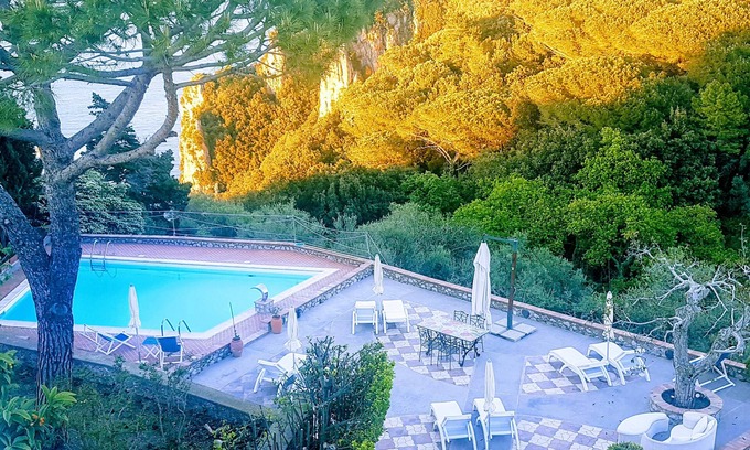 Tiberio Villa | Experience The Rock on the Sea: Ocean View & Spa Retreat