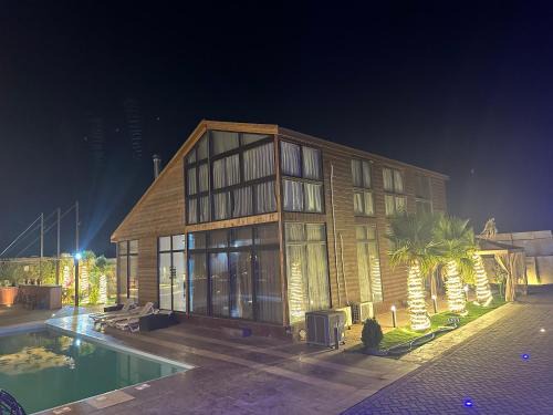Sahab Ski Chalet | Experience The Royal Cottage Amman with Oceanfront Views