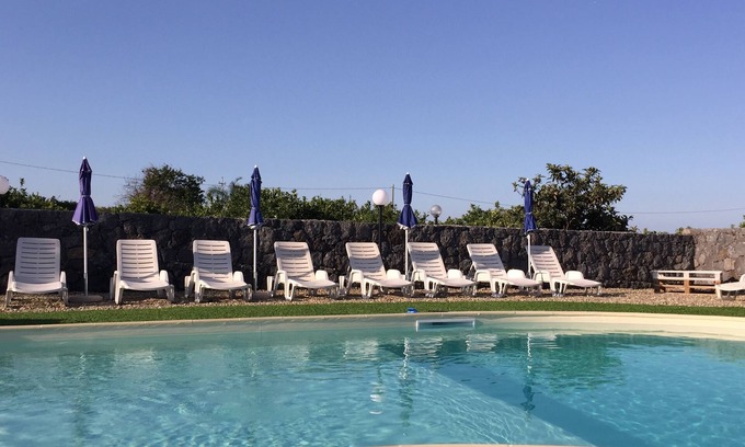 Santa Tecla House | Inviting Pozzillo Farmhouse with Garden & Shared Pool