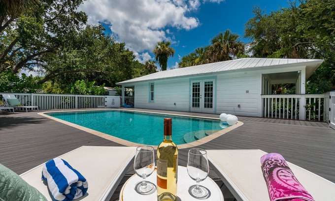 Stuart House | Discover Seaside Treasure: Refreshing Pool & Guesthouse