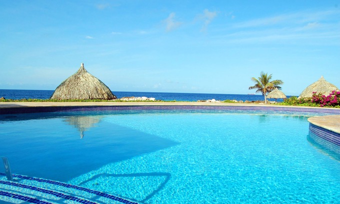 Nieuw Nederland Condo | Oceanfront Family Retreat with Pool and Hot Tub Awaits!