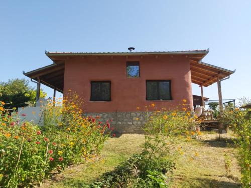 Pyli House | Experience The Strawhouse: Family-Friendly Retreat Awaits