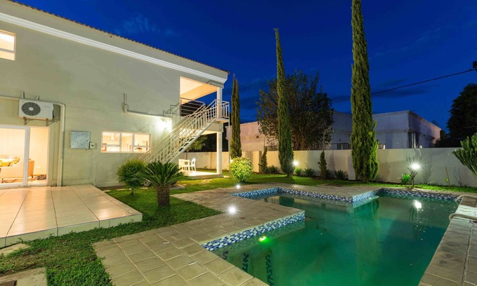 Gaborone House | Inviting The Studio Guest House: 4-Star Retreat with Pool