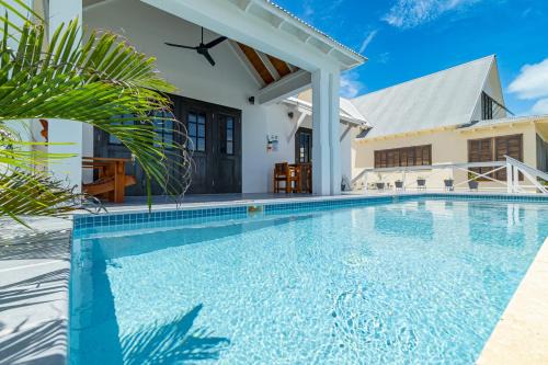 San Pedro Villa | The Toucan Nest and Pool Club at Mahogany Bay