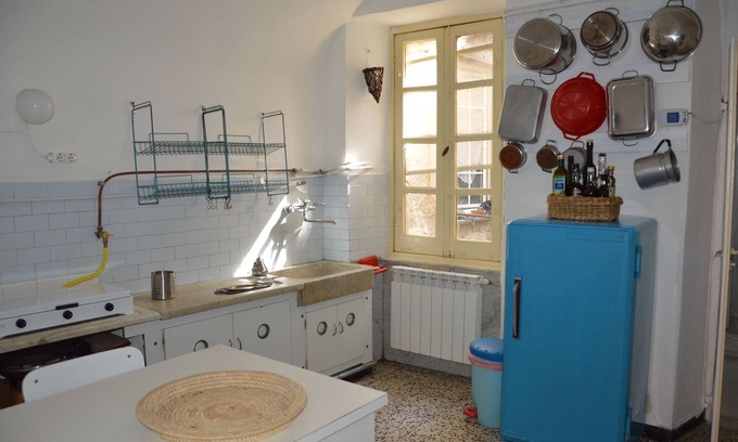 Sarzana House | Explore The Tower-house: Historical Gem in Sarzana Center