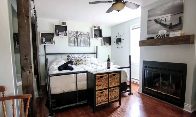 Bracebridge Apartment | Experience Relaxation in the Tuxedo Suite with Spa Amenities