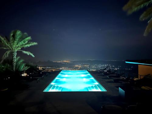 Al Hamra Hotel | Inviting Stay at The View with Pool and Breakfast Included