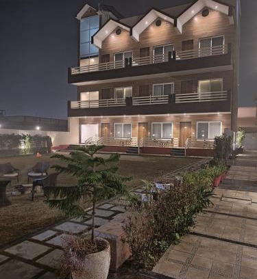 Vrindavan Hotel | Discover The VrindHuts: Family-Friendly with Pool Access