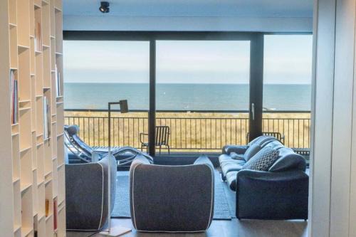 Cadzand-Bad Apartment | Beachfront Retreat: The Wave with Spectacular Sea Views