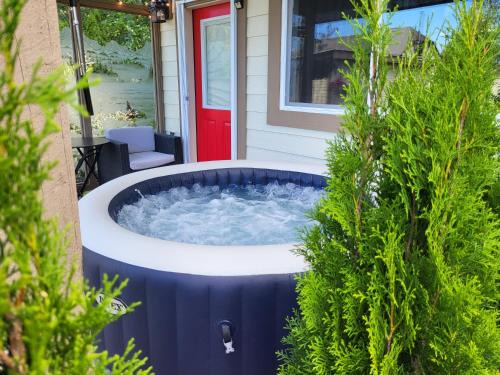 Courtenay House | Experience The White Rabbit Inn: Rated 9.5 with Hot Tub & Dining