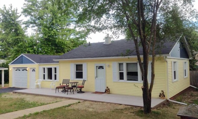 Michigan City Cottage | The Yellow House: Steps from Sheridan Beach with Breakfast