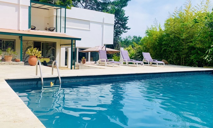Pinet Villa | Unwind at The Zen Villa: Oceanfront Bliss and Amenities