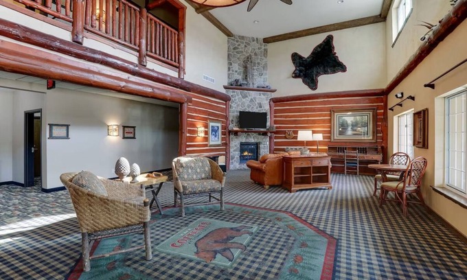 Johnston Hotel | Cozy Theme Suite with Whirlpool & Fireplace at Stoney Creek