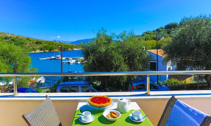 Agios Stefanos Apartment | Oceanfront Escape at Theophilos Ena – Rated 9.2 by Guests