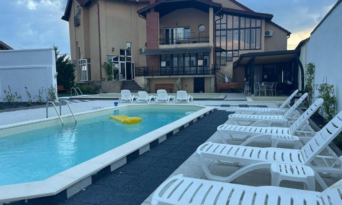 Sanmartin House | Family-Focused Thermal Resort with Pool & Ocean Views