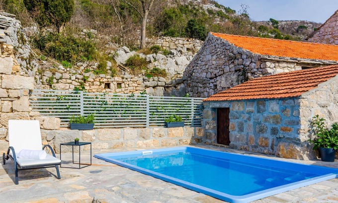 Stravca House | This beautiful stone house is located in the small idyllic village of Brotnica, not far from the fam