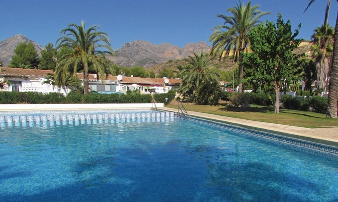 La Nucia House | This beautiful vacation semi-detached house is located in a quiet settlement with pool, tennis court