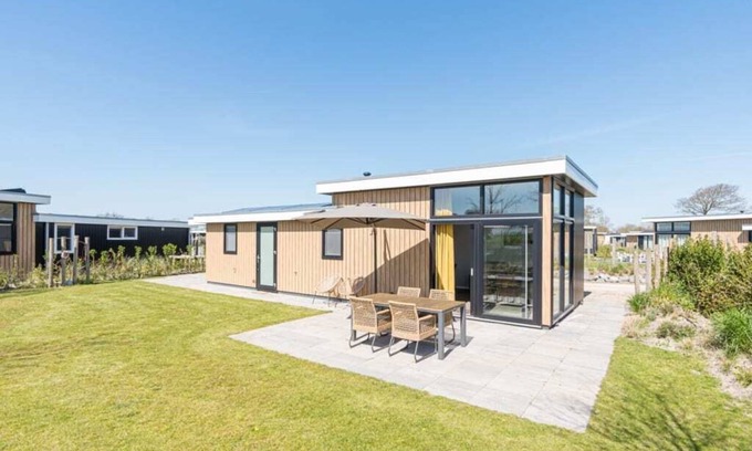 Burgh-Haamstede House | Modern Chalet near Park with Family-Friendly Amenities