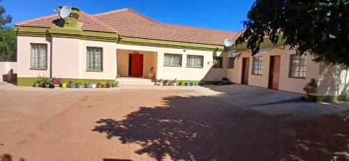 Kanye Bed & Breakfast | Top-Rated Thokgamo Bed and Breakfast with Hot Tub Access