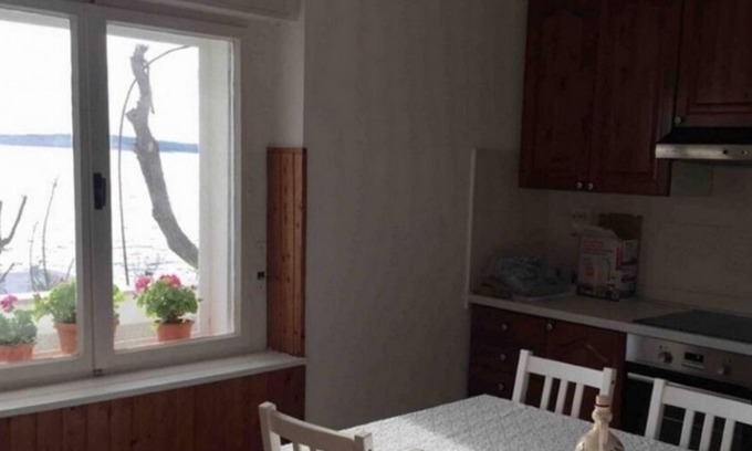 Kustici Apartment | Oceanfront Three-Bedroom Apartment Steps from Kustići Beach
