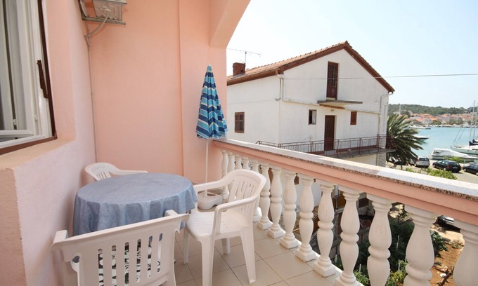 Kukljica Apartment | Inviting Three Bedroom Apartment with Terrace & Sea View