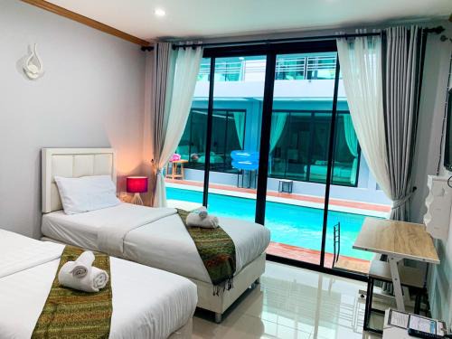 Nan Hotel | Pet-Friendly Stay at Three Bridges Hotel with Pool Access