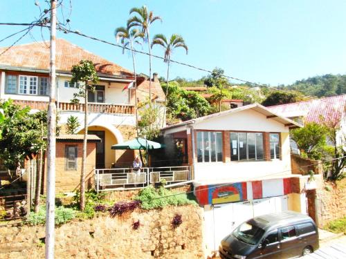 Fianarantsoa House | Family-Friendly Retreat at Three Palms Fianar