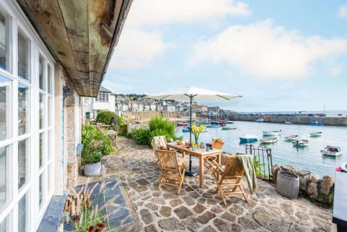 Mousehole House | Experience Tides Reach: 4-Star Stay with Family-Friendly Amenities