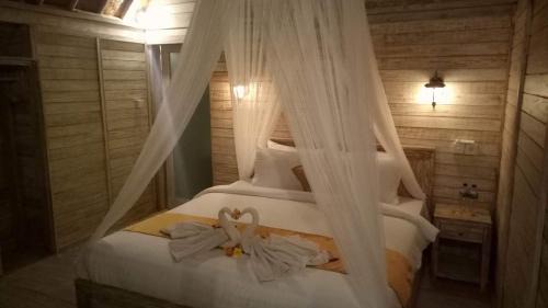 Jungut Batu House | Explore Tiki Bar & Poolside Fun at Our Family-Friendly Hotel