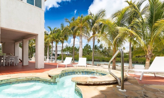 Sugarloaf Shores House | Discover Tiki Palms: 4 Bedroom Home with Pool & Dockage