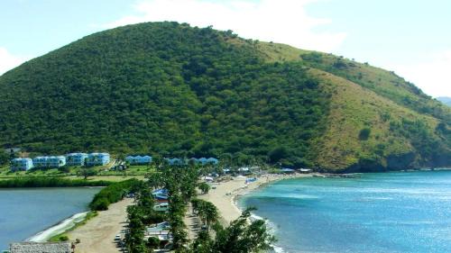 Frigate Bay Resort | Relax at Timothy Beach Resort with Oceanfront Amenities