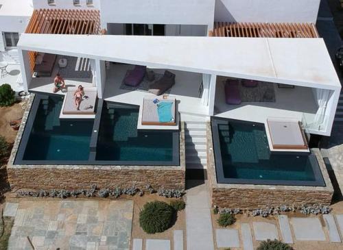 Tinos Town Villa | Experience Tinos Blend Suites: Pool, Hot Tub & 9.7 Rating