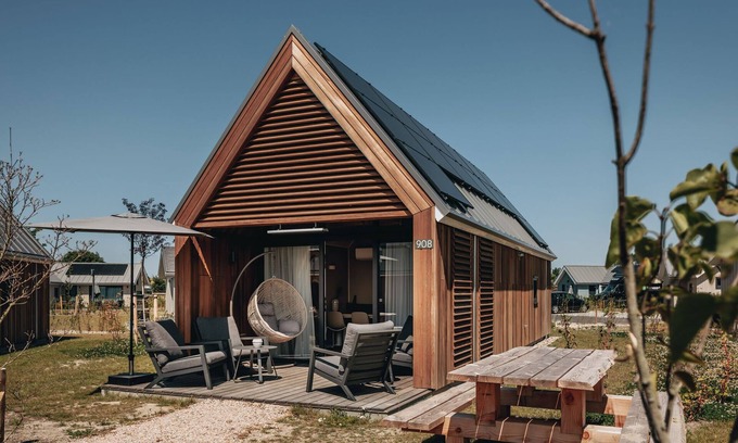 Nieuwvliet House | Modern Beachside Tiny House with Pool and Kitchen Access