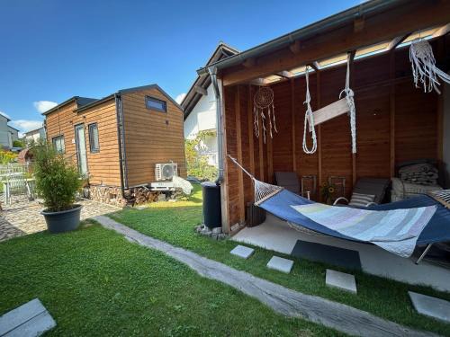 Brensbach Apartment | Cozy Tiny House with Sauna and Oceanfront Garden Escape