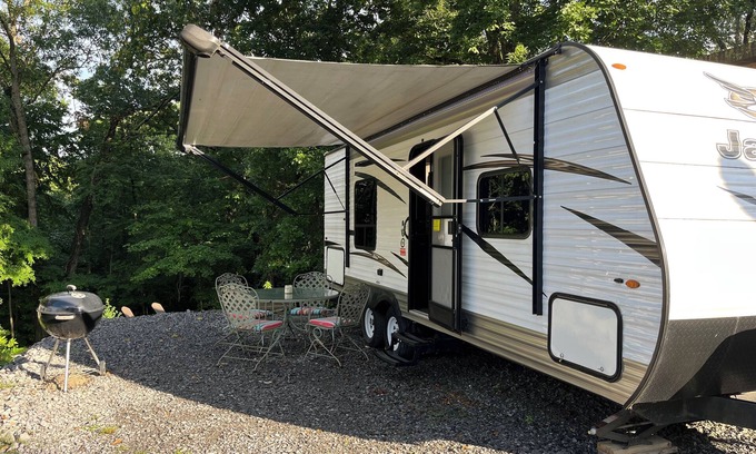 Aurora RV Rental | Cozy Tiny House on Wheels with Kitchen & Breakfast Included