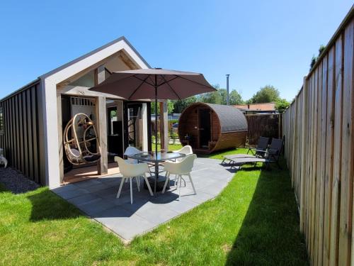 Heinkenszand Ski Chalet | Tranquil Zen House in Heinkenszand with Private Sauna