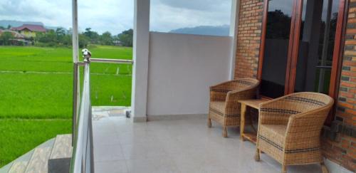 Tuk Tuk House | Budget-Friendly Toba Boi: Pet & Child Friendly Haven
