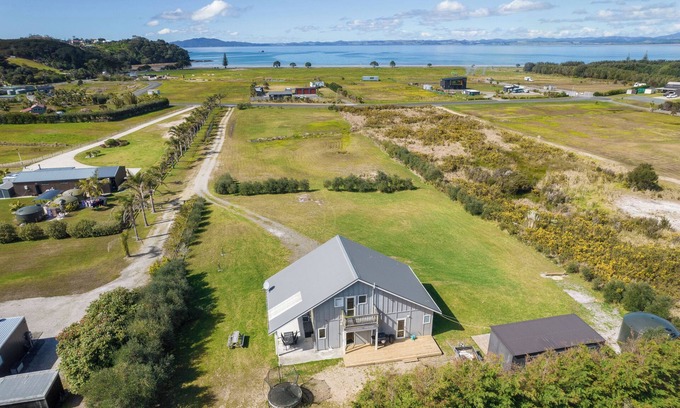 Karkari Peninsula House | Tokerau Magic - Family-Friendly Retreat with Ocean Views