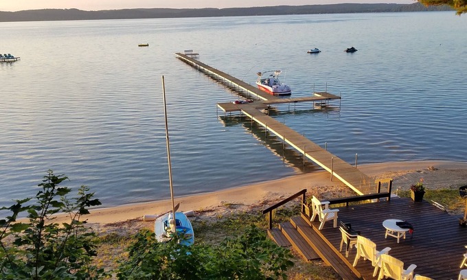 Empire House | Tonawathya - Lakefront Retreat with Private Beach & Dock