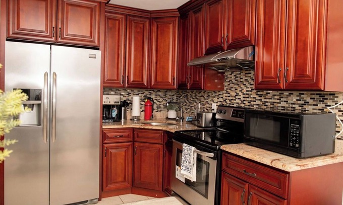Queens House | Explore The Red Stones in Queens with Kitchen Amenities
