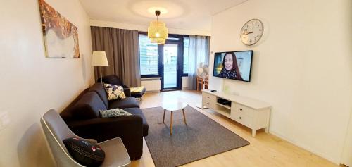 Itainen District Apartment | Elevated Retreat with Balcony & Eco-Friendly Amenities
