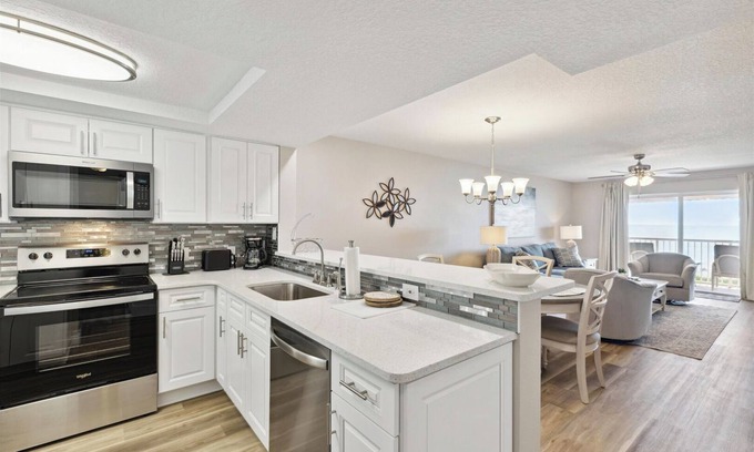 Cocoa Beach Condo | Top Floor Oceanfront Condo w/ Pool, Private Balcony, & Bright Coastal Design!