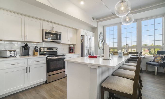 Manistee Condo | Exclusive Top Floor Penthouse at Edgewater - Rated 9.4/10