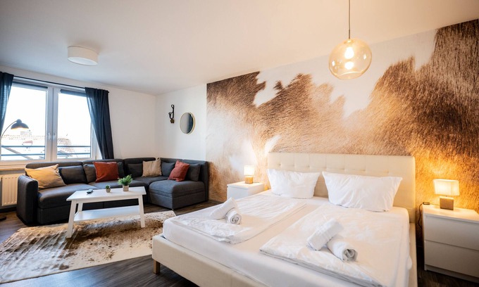 Kempten Apartment | Prime Location Featuring Unique Cow Design & Great Amenities